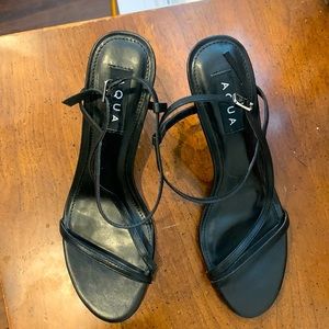Black sandals made by Aqua. 3 inch heel